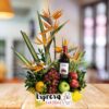 Arreglo Floral con Heliconias, aves del paraíso y vino