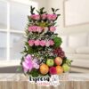 Arreglo Floral con Rosas y frutas frescas