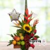 Arreglo Floral con Frutas, Rosas Rosadas y girasol